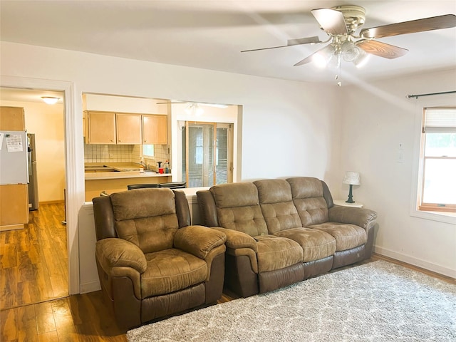 19 Millbrook Dr, Stony Brook, NY 11790 - living area featuring baseboards, a ceiling fan, and hardwood / wood-style floors