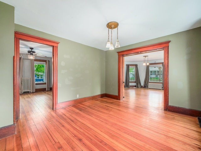 31 Highland Ave, Otisville, NY 10963 - unfurnished room with radiator, light wood-style flooring, and baseboards