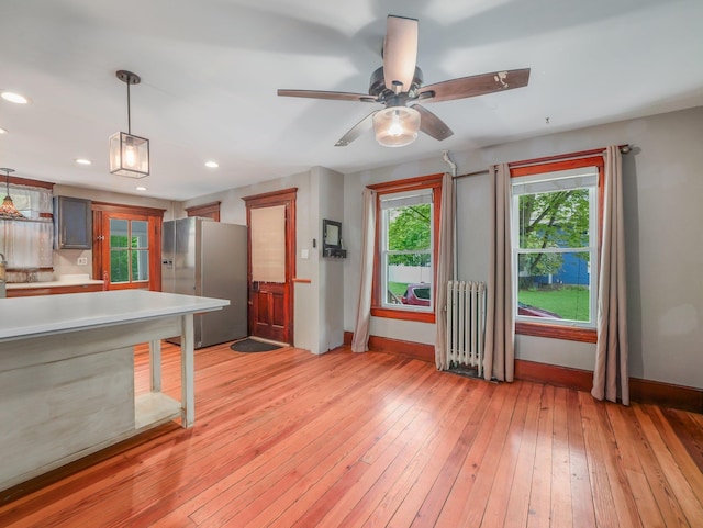 31 Highland Ave, Otisville, NY 10963 - unfurnished living room featuring radiator, baseboards, light wood-style floors, recessed lighting, and a ceiling fan