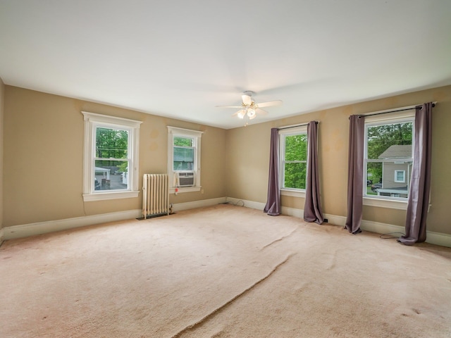 31 Highland Ave, Otisville, NY 10963 - spare room with radiator heating unit, carpet floors, ceiling fan, baseboards, and cooling unit