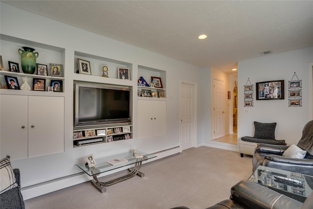 living room featuring visible vents, carpet floors, baseboards, recessed lighting, and built in shelves