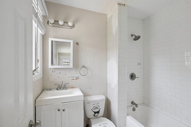 bathroom with shower / bathing tub combination, vanity, and toilet