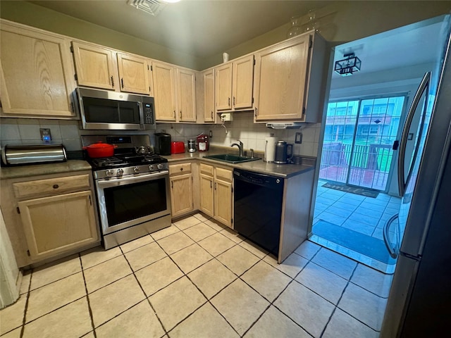 5 Fox Meadow Dr, Woodbury, NY 10930 - kitchen featuring a sink, stainless steel appliances, visible vents, decorative backsplash, and light tile patterned flooring