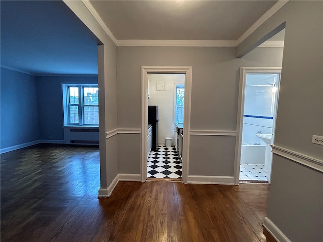 6 Midland Gdns Unit 5A, Bronxville, NY 10708 - entryway with crown molding, baseboards, and wood finished floors
