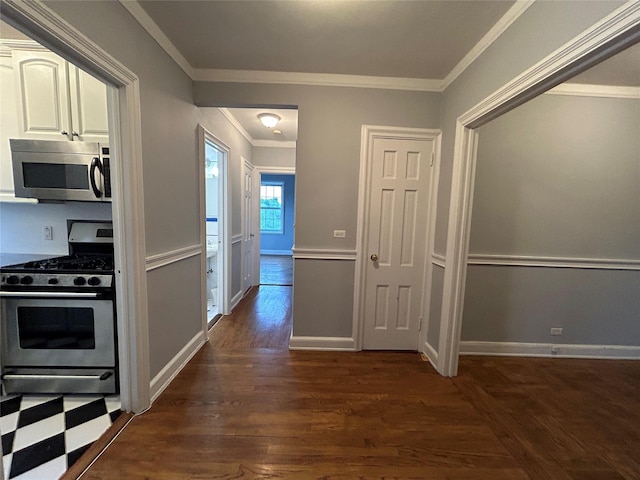 6 Midland Gdns Unit 5A, Bronxville, NY 10708 - hall with crown molding, dark wood-style flooring, and baseboards