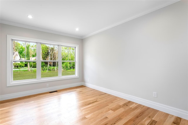 33 Lagoon Ct, Jamesport, NY 11901 - spare room featuring baseboards, crown molding, light wood-style flooring, and recessed lighting