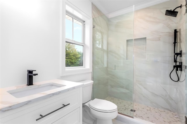 33 Lagoon Ct, Jamesport, NY 11901 - full bathroom featuring a marble finish shower, plenty of natural light, toilet, crown molding, and vanity