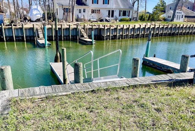 33 Lagoon Ct, Jamesport, NY 11901 - dock featuring a water view and a residential view