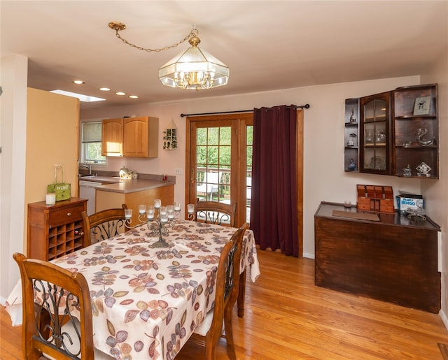 130 E Main St, Washingtonville, NY 10992 - dining area with light wood-type flooring, recessed lighting, baseboards, and an inviting chandelier