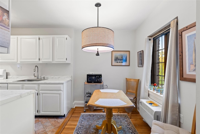 dining room featuring light wood-type flooring