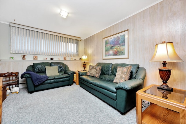 living room featuring crown molding and carpet flooring