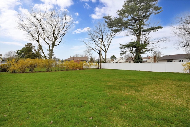 view of yard with fence