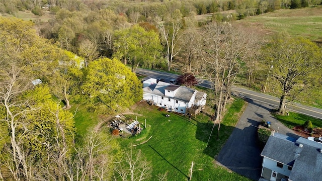 drone / aerial view with a view of trees