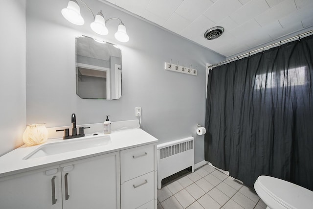 83 Woodcock Mtn Rd, Washingtonville, NY 10992 - bathroom featuring toilet, radiator, vanity, curtained shower, and tile patterned floors