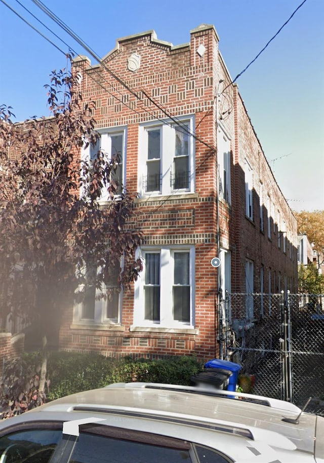 563 Williams Ave, Brooklyn, NY 11207 - view of property with fence