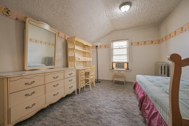 114-02 Sutter Ave, South Ozone Park, NY 11420 - bedroom featuring a textured ceiling, vaulted ceiling, carpet floors, cooling unit, and radiator