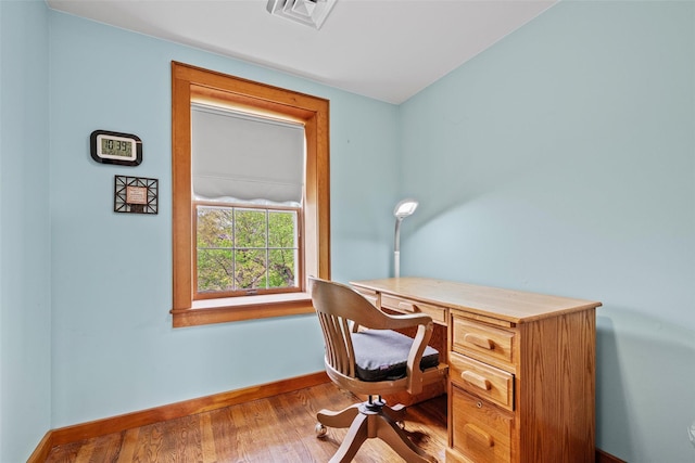 353 Berea Rd, Walden, NY 12586 - home office with visible vents, baseboards, and wood finished floors