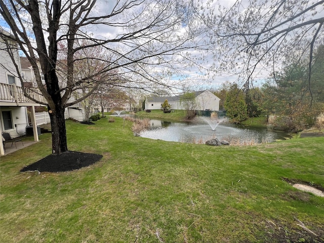 207 Cornwall Meadows Ln, Patterson, NY 12563 - view of green lawn featuring a water view and a patio
