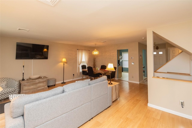 207 Cornwall Meadows Ln, Patterson, NY 12563 - living room featuring light wood-style floors and baseboards
