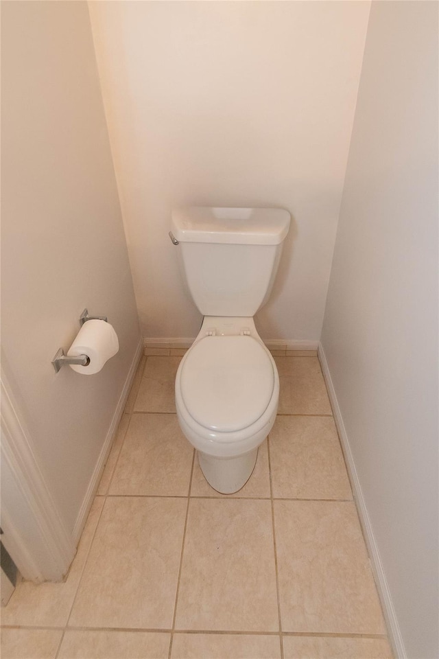 207 Cornwall Meadows Ln, Patterson, NY 12563 - bathroom featuring toilet, baseboards, and tile patterned flooring
