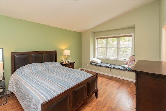 207 Cornwall Meadows Ln, Patterson, NY 12563 - bedroom featuring lofted ceiling, light wood-style floors, and baseboards