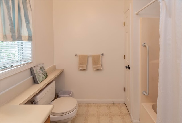 207 Cornwall Meadows Ln, Patterson, NY 12563 - full bathroom with toilet, baseboards, tile patterned floors, shower / bath combination with curtain, and vanity