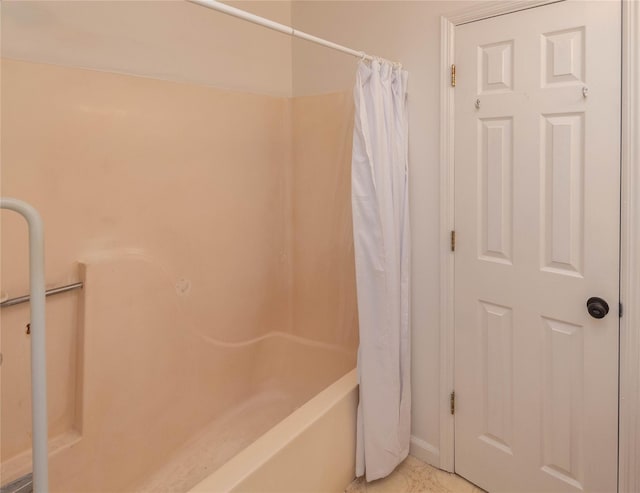 207 Cornwall Meadows Ln, Patterson, NY 12563 - bathroom featuring shower / bathtub combination with curtain and baseboards