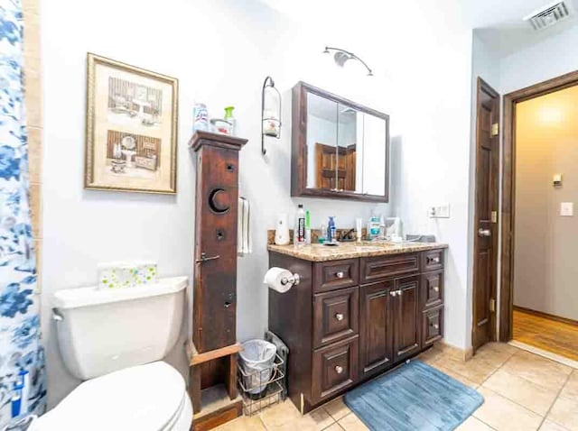 148 Chandler Ln, Montgomery, NY 12549 - bathroom featuring toilet, tile patterned flooring, vanity, and visible vents