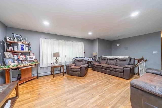 148 Chandler Ln, Montgomery, NY 12549 - living area featuring wood finished floors, a baseboard heating unit, and recessed lighting