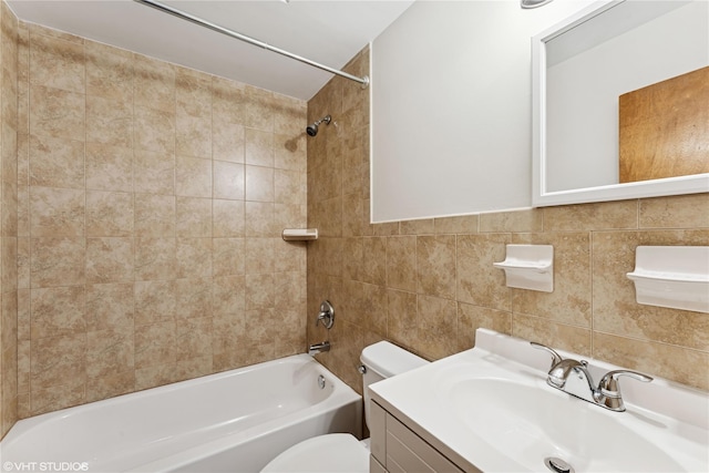 full bathroom featuring vanity, toilet, and tub / shower combination