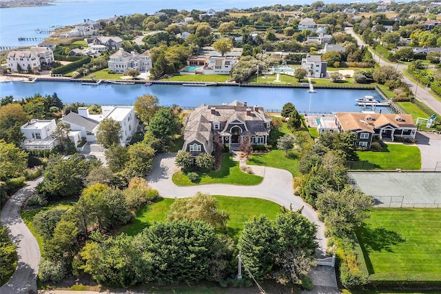 bird's eye view with a water view and a residential view
