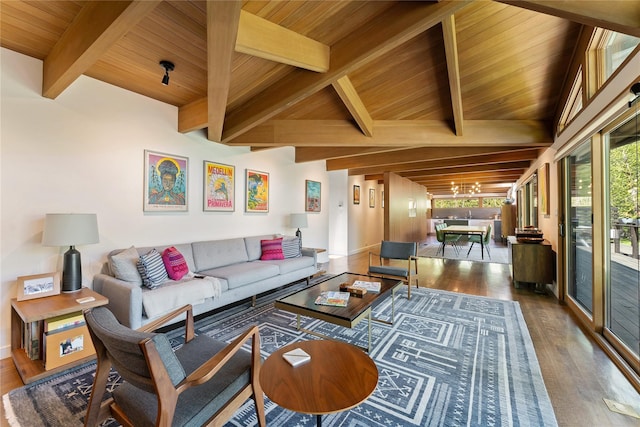 living area featuring wood ceiling, a healthy amount of sunlight, and wood finished floors