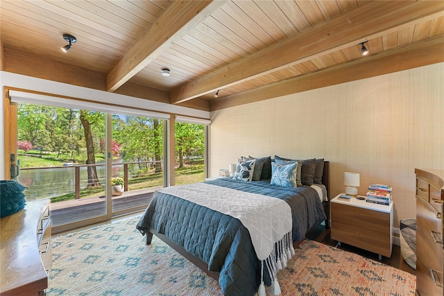bedroom featuring wooden ceiling, multiple windows, beam ceiling, and access to exterior