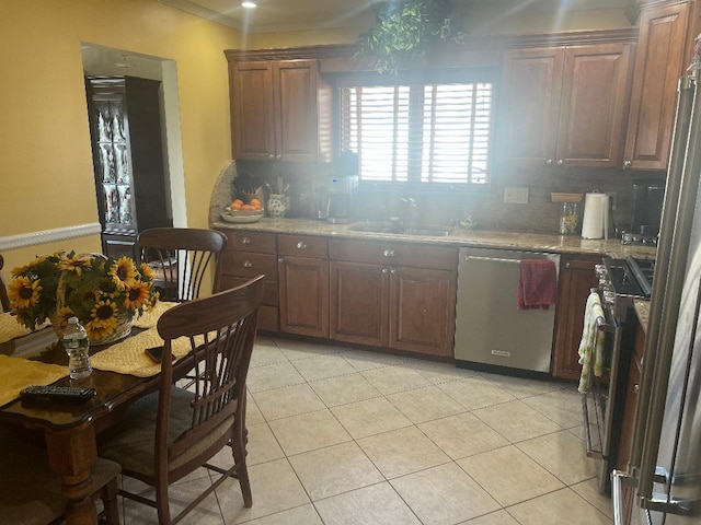 84-08 164th Ave, Howard Beach, NY 11414 - kitchen featuring decorative backsplash, crown molding, a sink, appliances with stainless steel finishes, and light tile patterned flooring