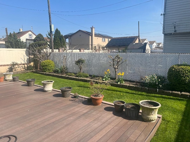 84-08 164th Ave, Howard Beach, NY 11414 - deck with a fenced backyard and a yard