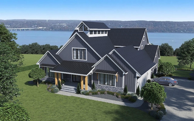 view of front of house featuring covered porch, a standing seam roof, a shingled roof, and board and batten siding