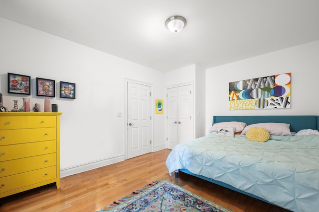 bedroom featuring wood finished floors