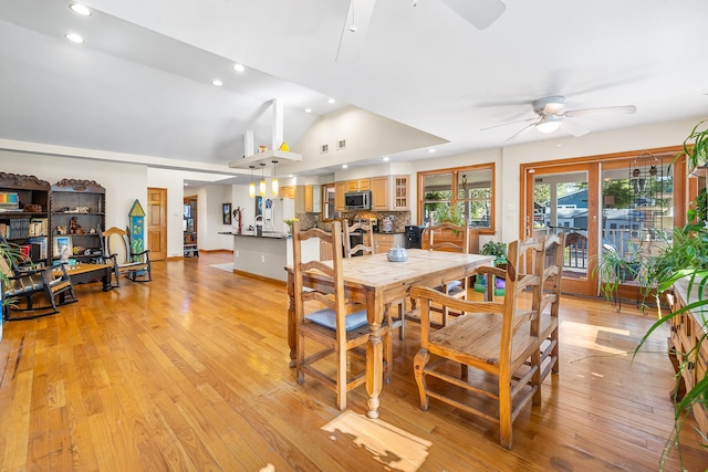 dining room with recessed lighting, light wood finished floors, ceiling fan, and lofted ceiling