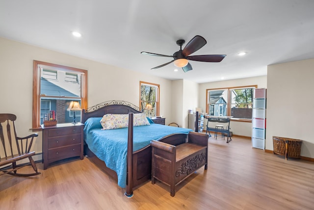 bedroom featuring ceiling fan, recessed lighting, and light wood-style flooring