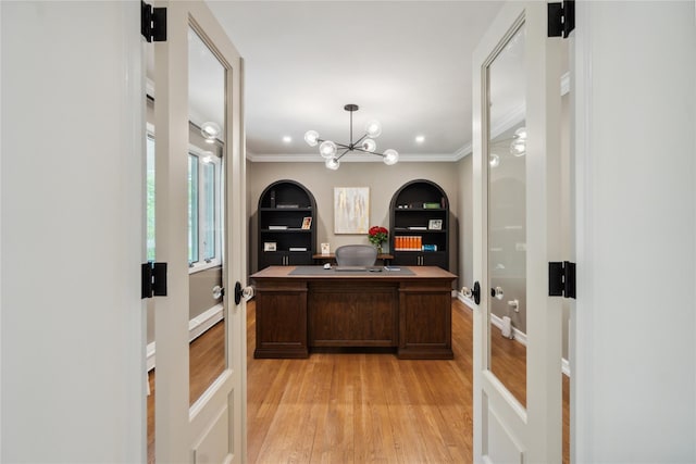 office area featuring crown molding, a notable chandelier, and light wood-style floors