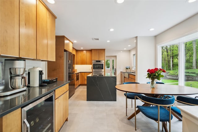 kitchen featuring wine cooler, recessed lighting, and appliances with stainless steel finishes