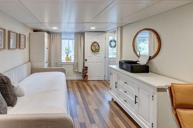 bedroom featuring recessed lighting and wood finished floors