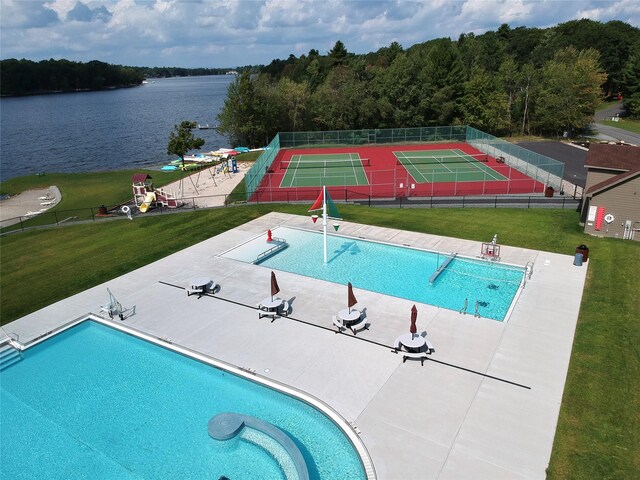 11 Lakeview Ct, Rock Hill, NY 12775 - pool featuring a tennis court, fence, a water view, and a lawn