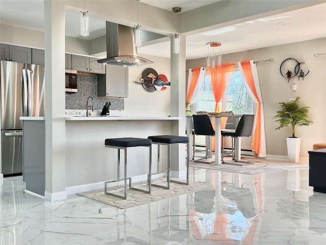 11 Lakeview Ct, Rock Hill, NY 12775 - kitchen with decorative backsplash, gray cabinets, marble finish floor, island range hood, and freestanding refrigerator