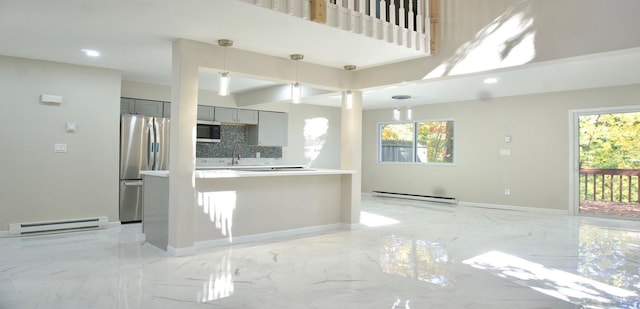 11 Lakeview Ct, Rock Hill, NY 12775 - kitchen with baseboard heating, stainless steel appliances, gray cabinetry, and marble finish floor