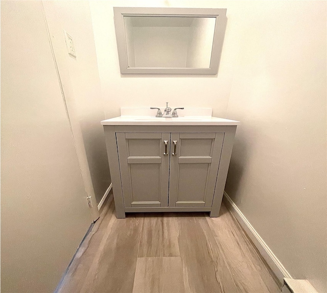 11 Lakeview Ct, Rock Hill, NY 12775 - bathroom with vanity, wood finished floors, and baseboards