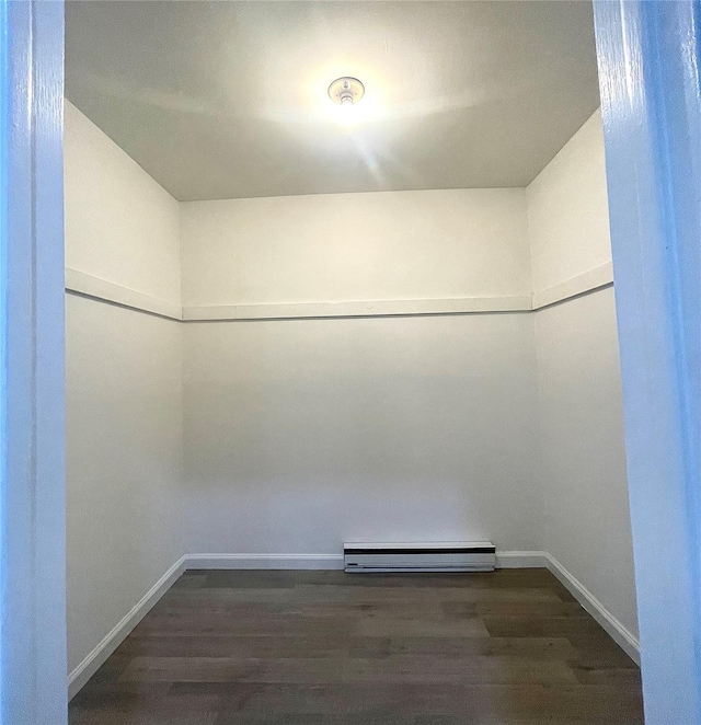 11 Lakeview Ct, Rock Hill, NY 12775 - spacious closet featuring a baseboard heating unit and dark wood-type flooring