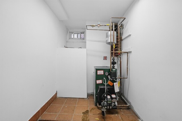 4465 Park Ave, Bronx, NY 10457 - utility room with a heating unit