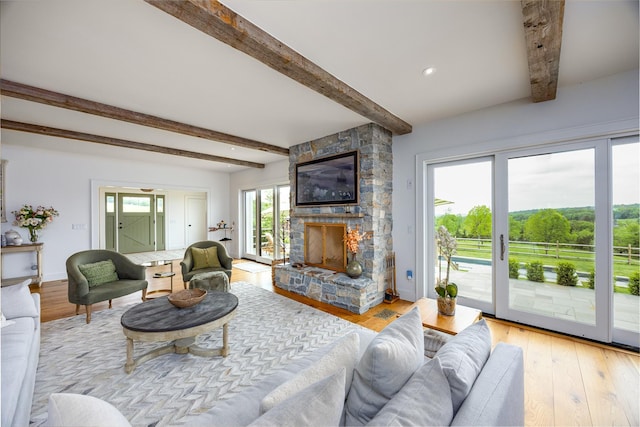 3585 Rte 82, Millbrook, NY 12545 - living room featuring beamed ceiling, wood finished floors, a fireplace, and recessed lighting