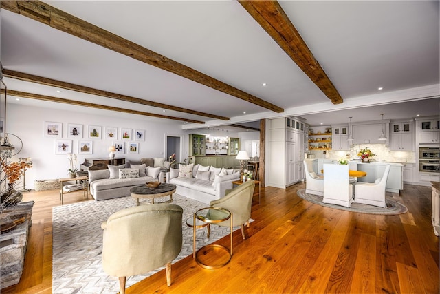 3585 Rte 82, Millbrook, NY 12545 - living area with beam ceiling, wood finished floors, and recessed lighting